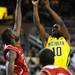 Michigan junior Tim Hardaway Jr. shoots the ball over North Carolina State junior C.J. Leslie during the first half at Crisler Center on Tuesday night. Melanie Maxwell I AnnArbor.com
